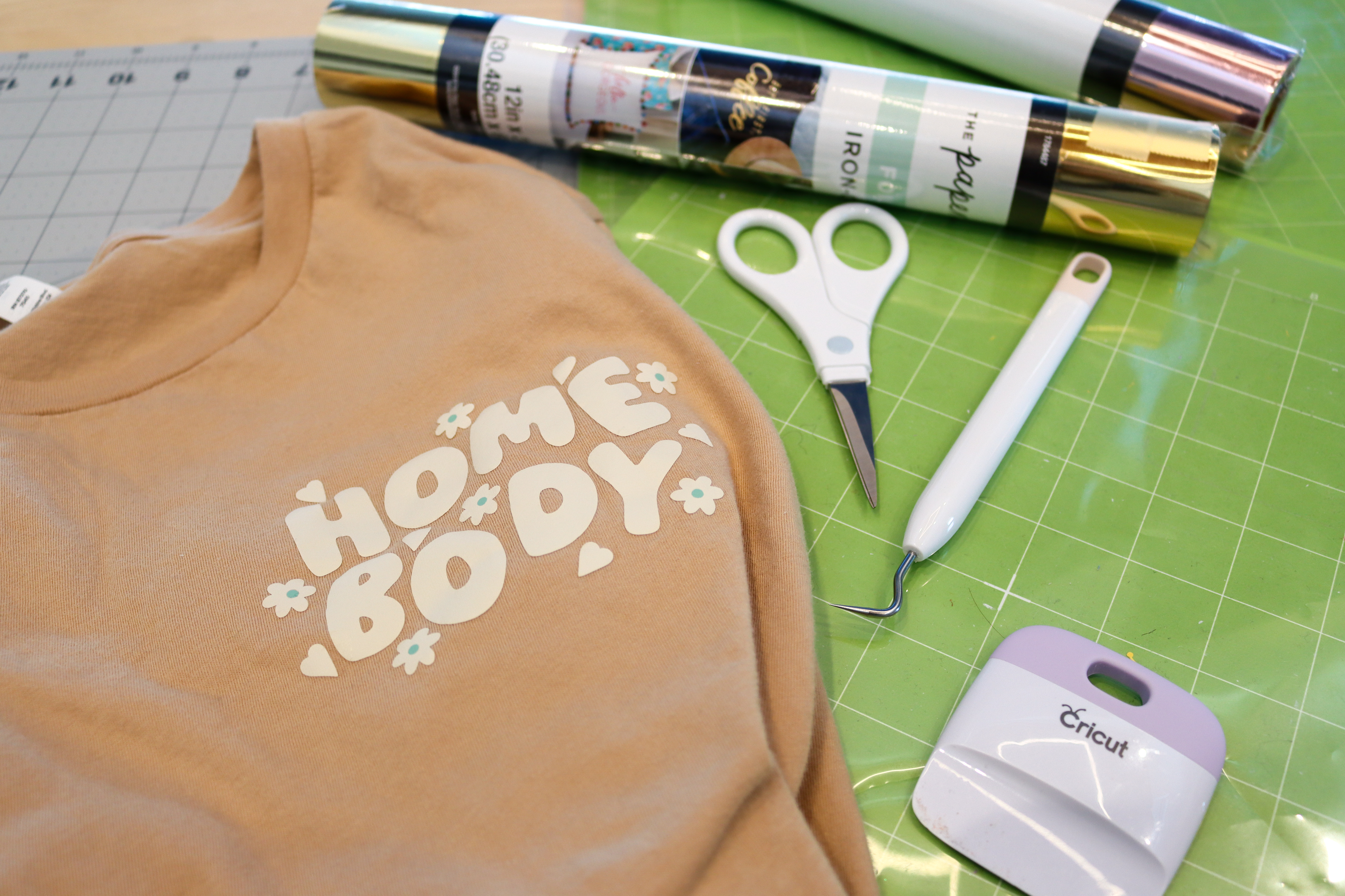 T-shirt with iron-on vinyl that says Home Body