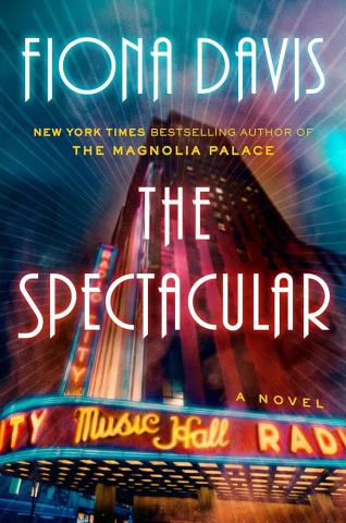 The Spectacular book cover: bright lights on a theatre sign reading "Music Hall Radio City"