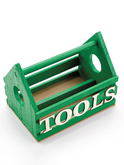 Green wooden toolbox with TOOLS in white letters.